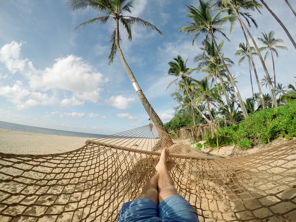 person on beach hammock